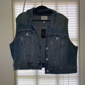 Medium wash denim vest